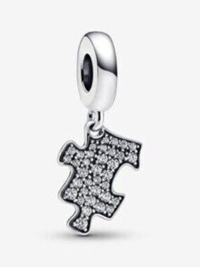 Authentic Pandora Sparkling Puzzle Piece Dangle Charm.